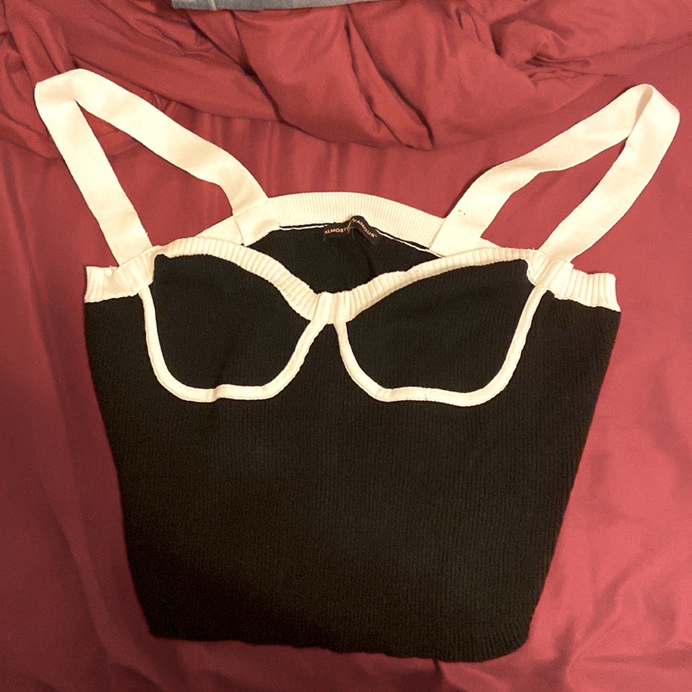 I’m selling a black and white crop-top that is from rainbow